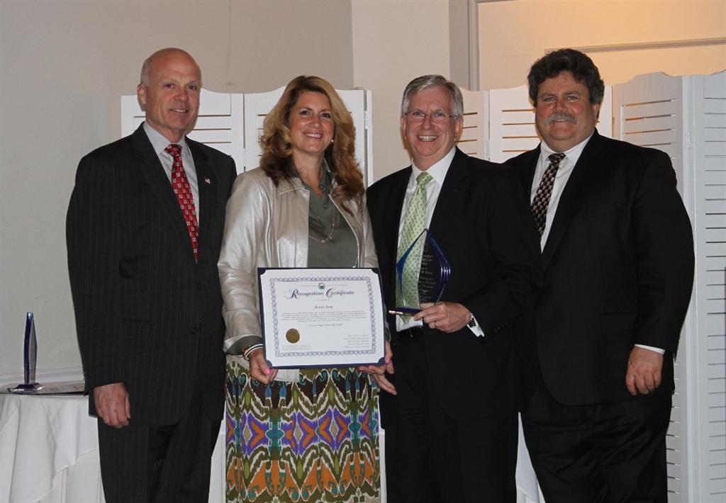 Freeholder Director Gary J. Rich, Sr., Freeholder Deputy Director Serena DiMaso and Wyatt Earp, Vice Chairman of the Monmouth County Workforce Investment Board (WIB) (far right) present the Government Award to Dennis Bone (second from right), Chairman of the State Employment and Training Commission (SETC), at the WIB’s Partnership Award Dinner on April 29 in Long Branch, NJ.